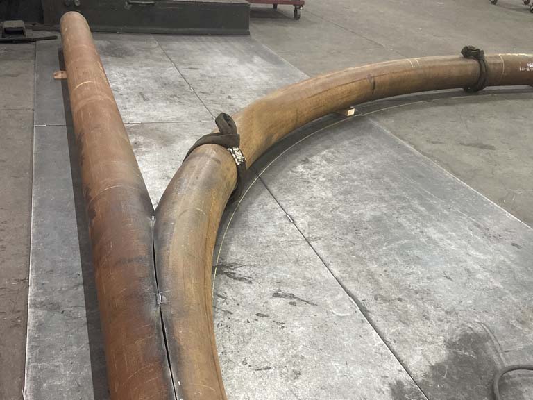 10" SCH120 SA106B SMLS bent to a 12 foot radius.